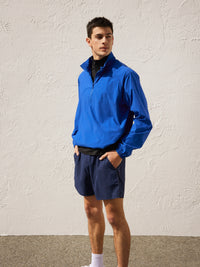 a person wearing a blue jacket