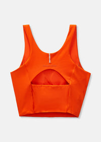a person wearing an orange tank top