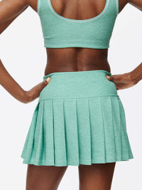 Doing Things 3" Skort view from behind showing pleats and built-in shorts in a stylish mint green.