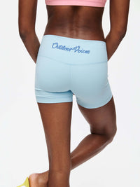 Gemini 3" Short in light blue showcasing Outdoor Voices logo on the back waistband.