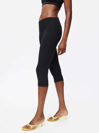 Model showcasing the Grass Capri legging in black, perfect for everyday comfort and style.