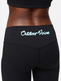 Outdoor Voices logo feature on the back waistband of Grass Capri capri leggings.