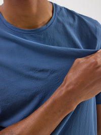 a person wearing a blue shirt