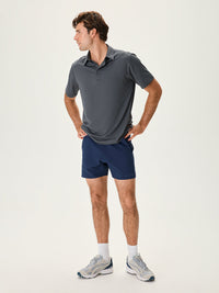 a person wearing a grey shirt