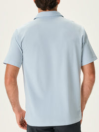 a person wearing a light blue shirt