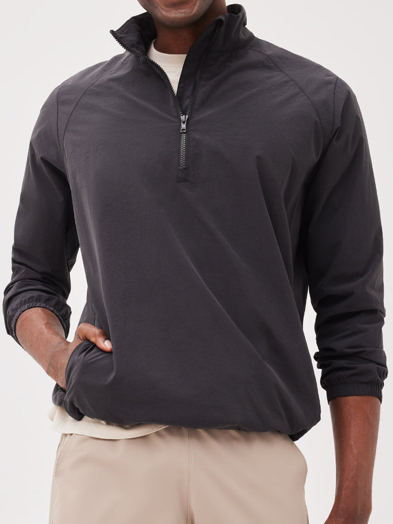 a person wearing a black jacket