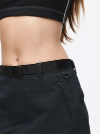 Close-up of the Outdoor 4" Skort featuring adjustable waistband and zippered pocket.