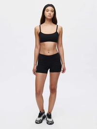 Model wearing Solar Bra with soft elastic band and adjustable straps, showcasing comfort and style in activewear.