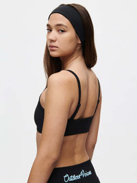 Model showcasing the Solar Bra featuring soft adjustable straps and a sleek design.