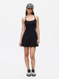 Sporty Dress featuring adjustable straps and a flared skirt, perfect for active wear and stylish outings.
