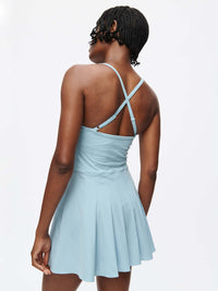 Sporty Dress showcasing back view with dual-fabric design and adjustable straps in light blue color.