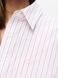 Close-up of the Striped Sun Shirt featuring subtle stripes and embroidered OV signature.