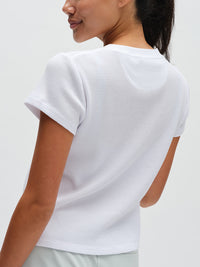 Waffle Baby Tee in White – back close-up showing waffle texture