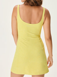 a person wearing a yellow dress