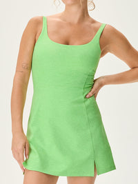 a person wearing a green dress