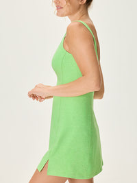 a person wearing a green dress