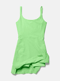 a person wearing a green dress