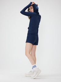 a person wearing a navy sweater