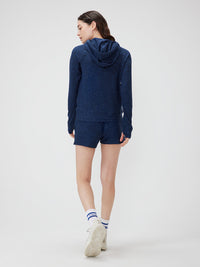 a person wearing a navy sweater
