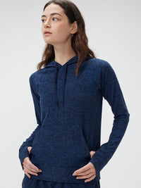 a person wearing a navy sweater