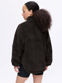 Back view of Candy Fleece Snap Jacket in Dark Brown, featuring an oversized fit and cozy fleece texture.