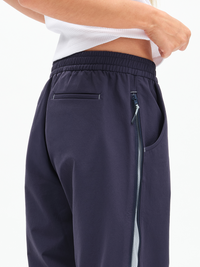 RecTrek Zip Pant in Indigo Multi – back close-up of waistband, pocket and side zip