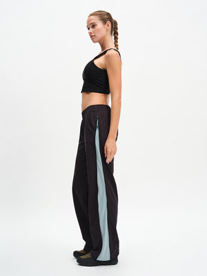 RecTrek Zip Pant in Black Multi – side full-length view showing contrast side panel