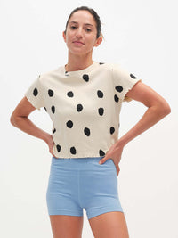 Model posing in Echo 3.5" Short in Cotton Candy, featuring a tall waistband and supportive stretch.