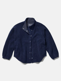 a person wearing a navy jacket