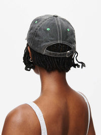 Washed Hat, back view showing the washed cotton material and topstitching details, for outdoor activities.