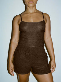 Model wearing CloudKnit Cami in Dark Brown with slim fit and adjustable straps, styled for lounging.