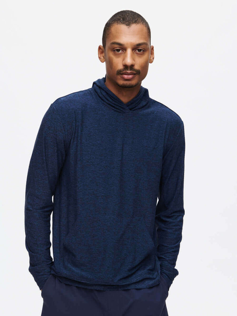 Model wearing CloudKnit Hoodie in Navy with a relaxed fit and cowl neck, for everyday wear.