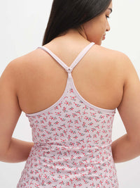 Back view of Club Dress in Floral Pink, featuring adjustable straps and a cute bow detail.