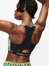 Doing Things Bra with mesh backing and Outdoor Voices logo, for high-performance activities.
