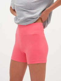 Model posing in Echo 3.5" Short in Cotton Candy, featuring a tall waistband for gentle support.