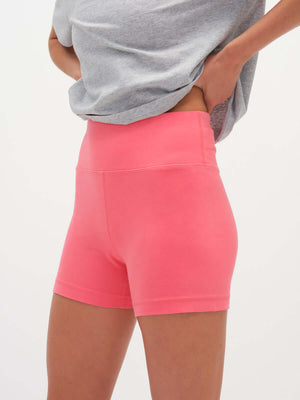 Model posing in Echo 3.5" Short in Cotton Candy, featuring a tall waistband for gentle support.