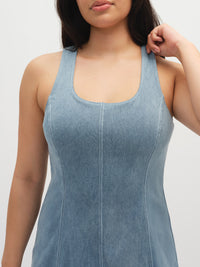 Close-up of model wearing Energy Dress in Light Blue with a sleek, fitted design and racerback straps.