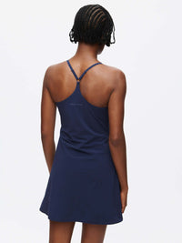Back view of The Exercise Dress in Navy with adjustable straps and a built-in shorts liner, ideal for activewear.