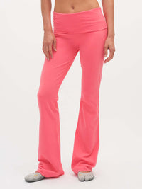 Model posed in Flared Legging in Cotton Candy, featuring an extra-tall foldable waistband for a customizable fit.