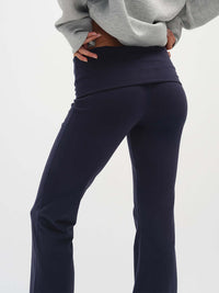 Back view of Flared Legging in Navy with an extra-tall waistband, for lounging or casual wear.