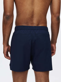 Back view of High Stride 5" Short with Pockets in Navy, with the elastic waistband and lightweight design.
