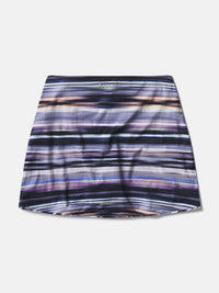 Flat lay of LightSpeed Minimal 3" Skort in multi-colored stripes, featuring a soft and stretchy fabric.