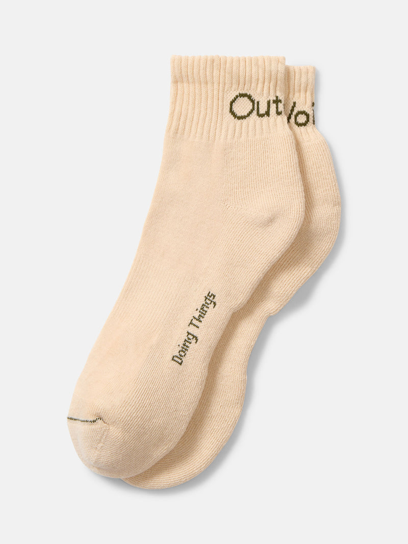 Flat lay of OV Rec Ankle Sock in Cream, featuring ribbed ankle and soft fabric for everyday wear.