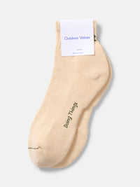Flat lay of OV Rec Ankle Sock in beige showing the soft, cushioned fabric and ribbed ankle design.