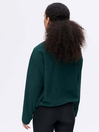 Back view of RecFleece 1/4 Zip in Evergreen, showing adjustable toggle at hem for a customizable fit.