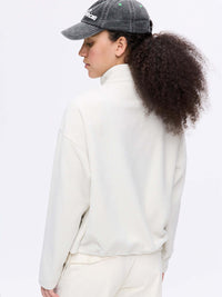 Back view of RecFleece 1/4 Zip in Soft White, featuring adjustable toggle at hem for a customizable fit.