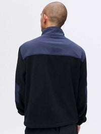 Back view of RecFleece Relaxed Full Zip in Black with contrast RecTrek shoulder panels.