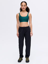Model standing in RecTrek 29" Pant in Black, featuring a pull-on style with an adjustable drawstring.