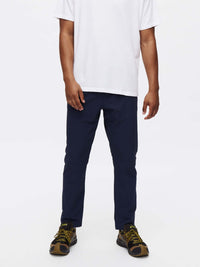 Model standing in RecTrek Pant in Navy with a relaxed fit and zippered pockets, ready for active adventures.