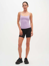 Model standing in Echo 5.5" Short in Black, featuring a tall waistband and supportive stretch.